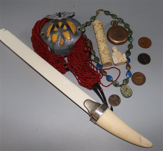 An Edwardian silver mounted ivory page turner and other items.
